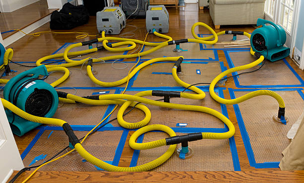 Professional Flood Damage Restoration technician working in Eaton Center, NH
